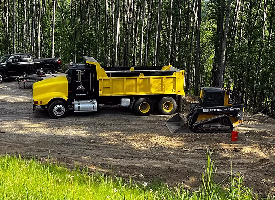 Image of dirt being hauled to customer